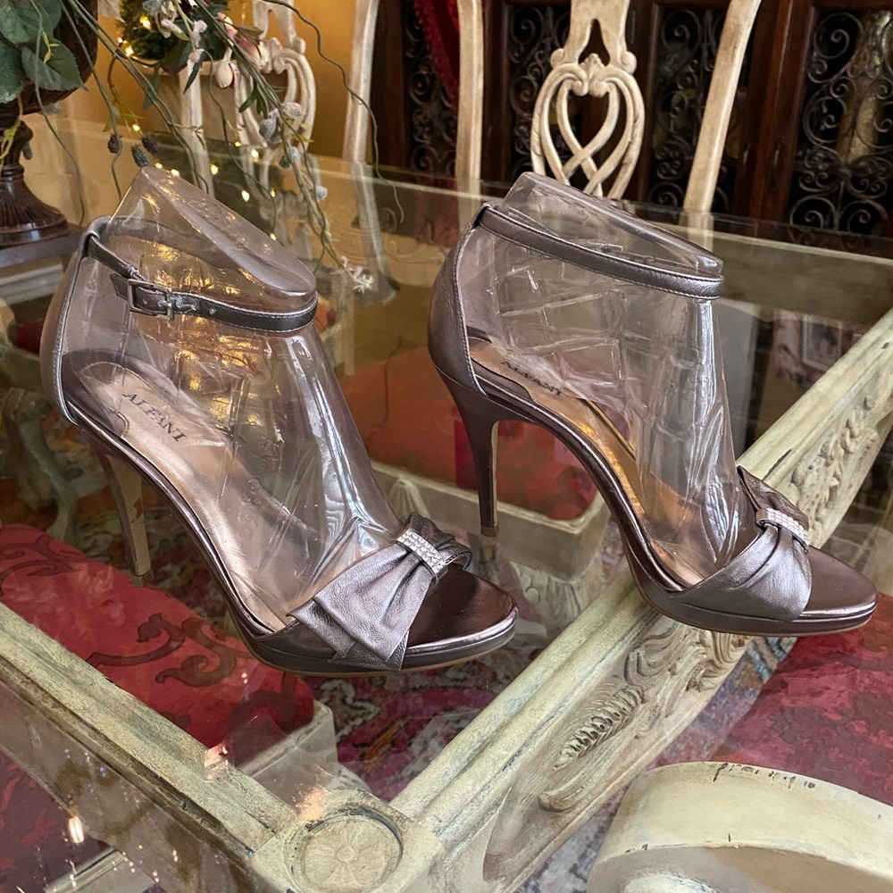 Silver, leather Alfani dressy heels with Rhinestone embellishment on front strap